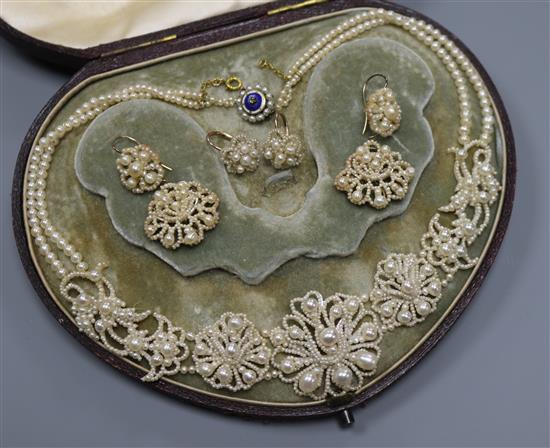 An early 19th century mother of pearl and seed pearl necklace with enamel and diamond set clasp and a pair of similar earrings.